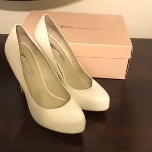 BCBGeneration White snakeskin pumps